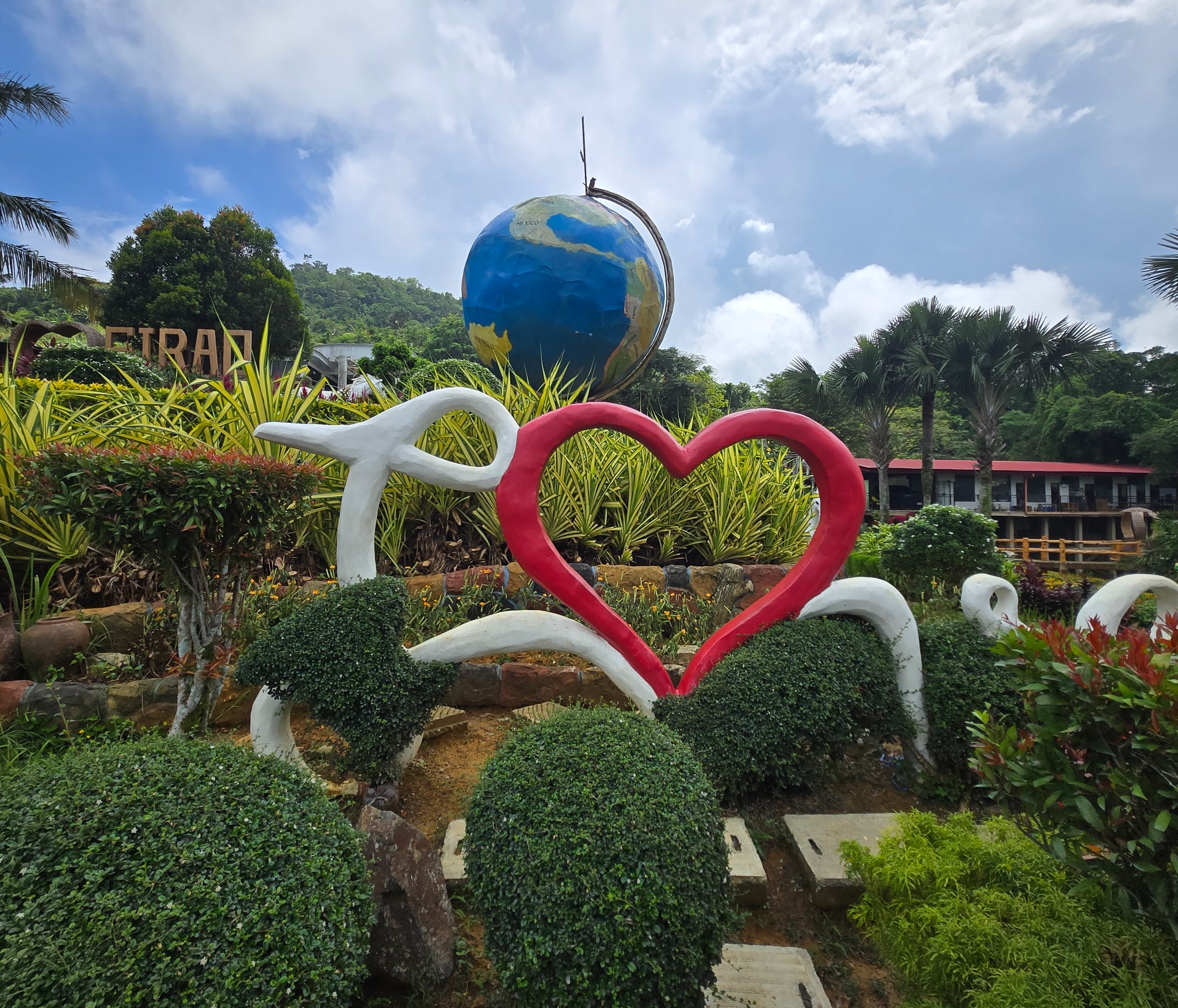 Heart sculpture and globe at Sirao Garden in Cebu